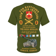 Load image into Gallery viewer, Unisex Cut &amp; Sew Tee (AOP) - C Battery,  2nd Bn 28th Artillery - 210th FA Bde - Ansbach Germany  w M109 w Overseas Cold SVC
